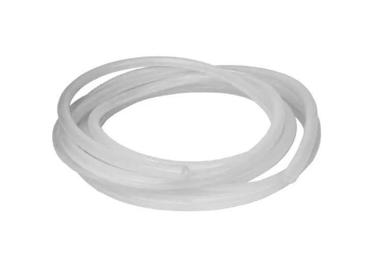 A coil of translucent silicone tube on a white background.