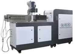 Parallel counter rotating twin-screw extruder shown on a white background.